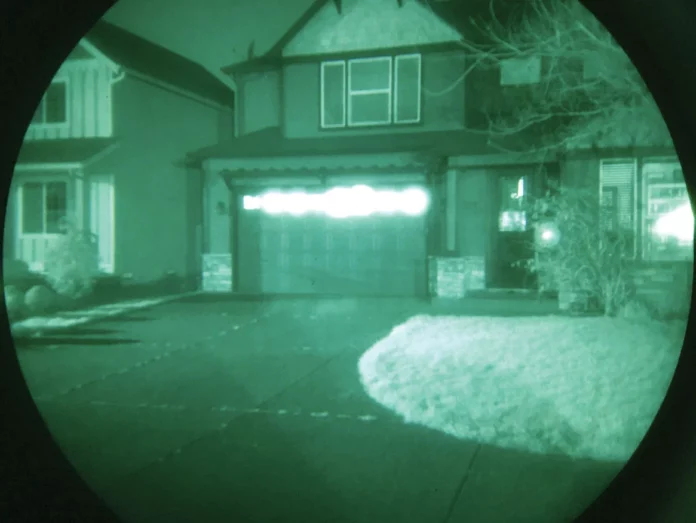 Why is the image always green in a night vision device?